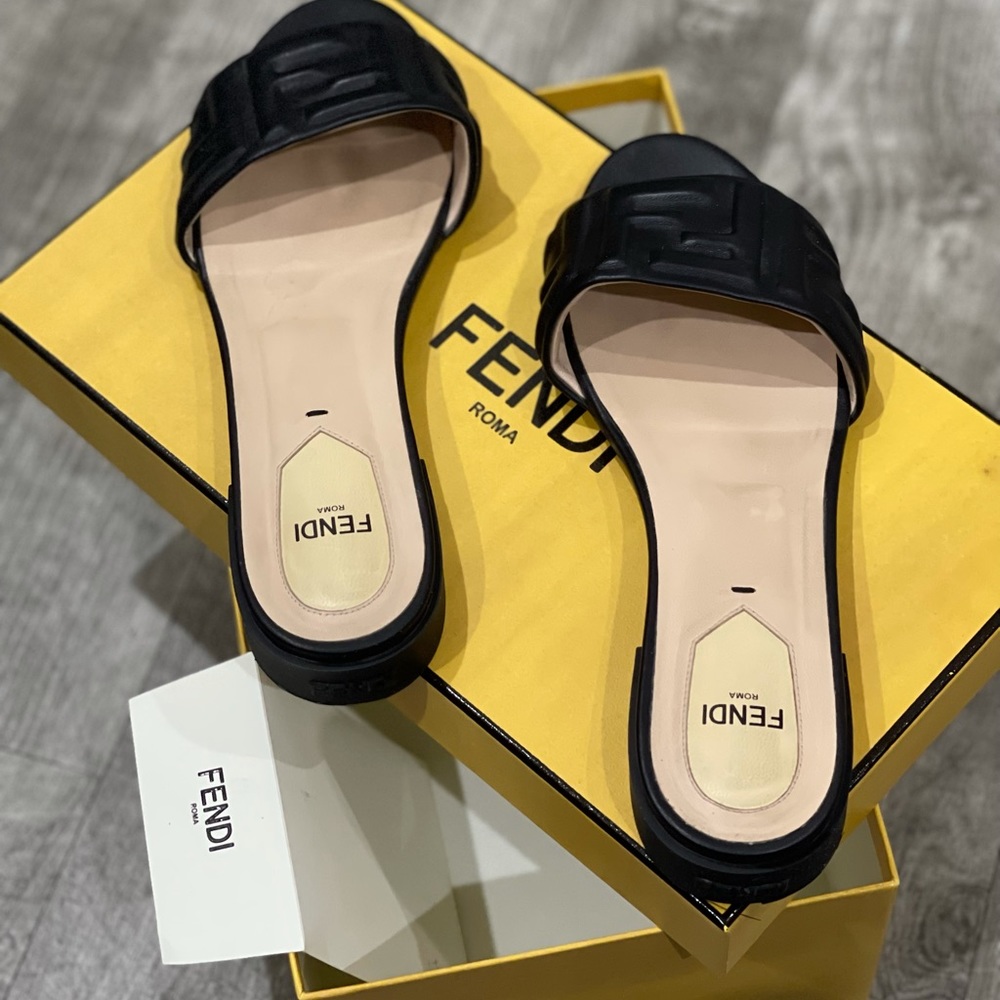 FENDI
Promenade FF Leather Slide Sandals